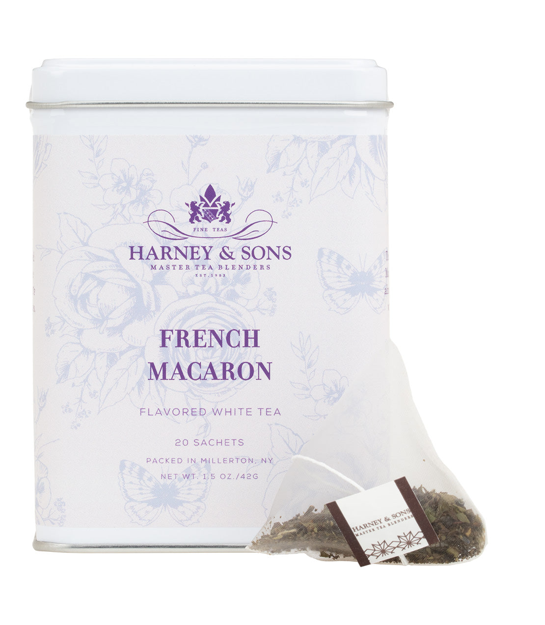 Tin of 20 sachets of Harney & Sons French Macaron flavored white tea, featuring floral design and branding.