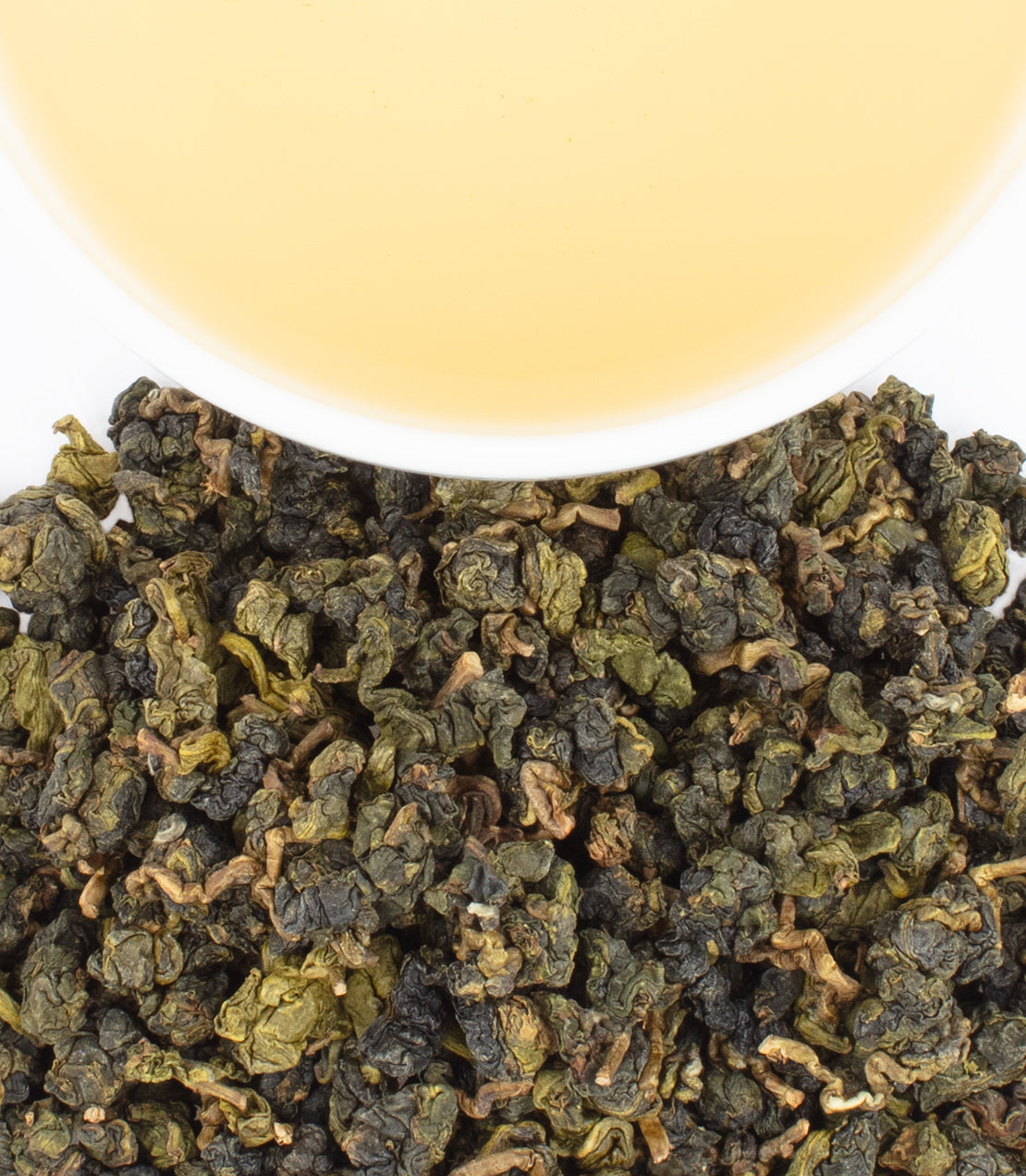 Dong Ding Traditional oolong tea leaves with a cup of brewed tea, showcasing rich colors and textures.