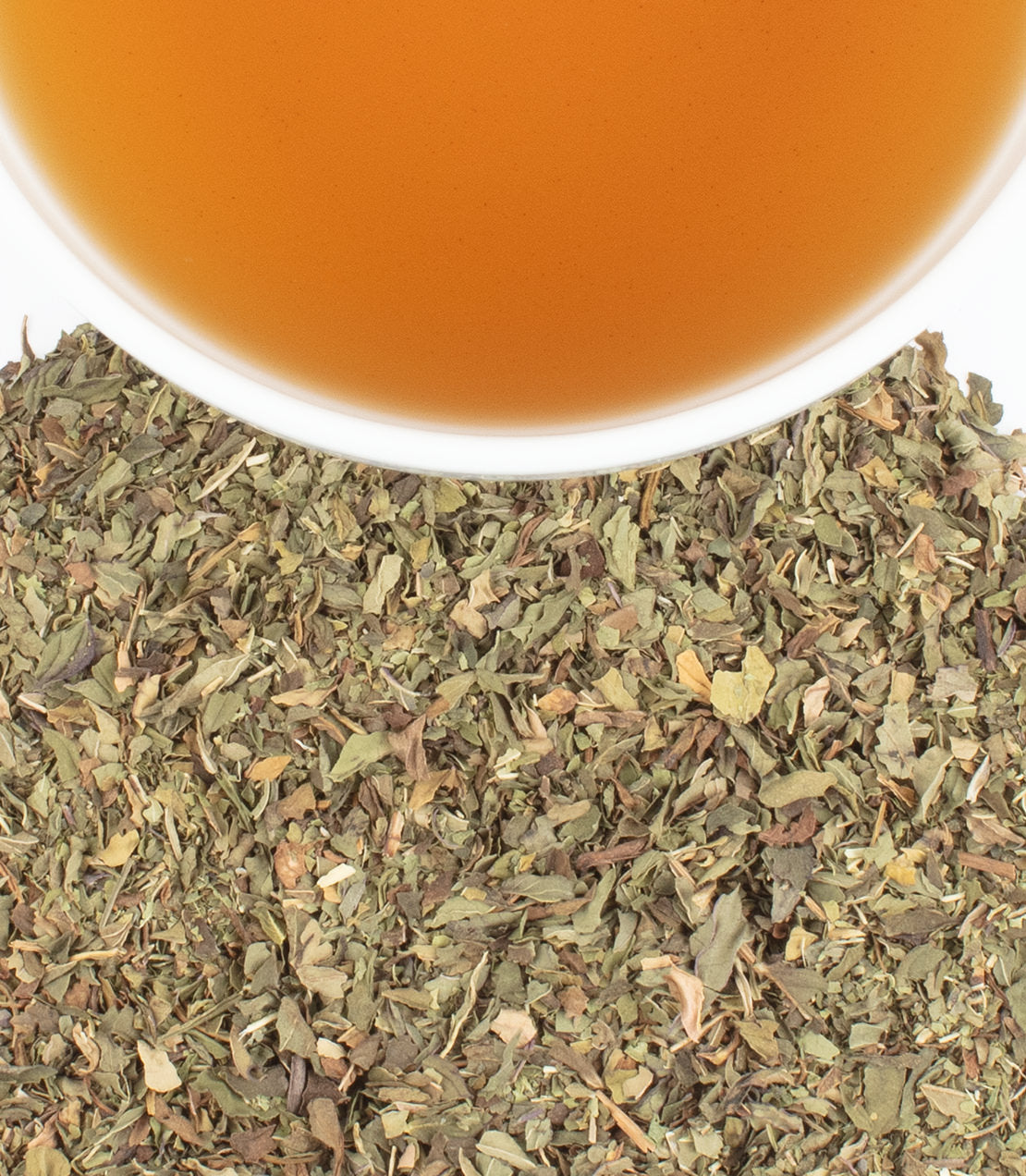 Harney & Sons Fine Teas- Mint Verbena- Cup of tea surrounded by leaves from above