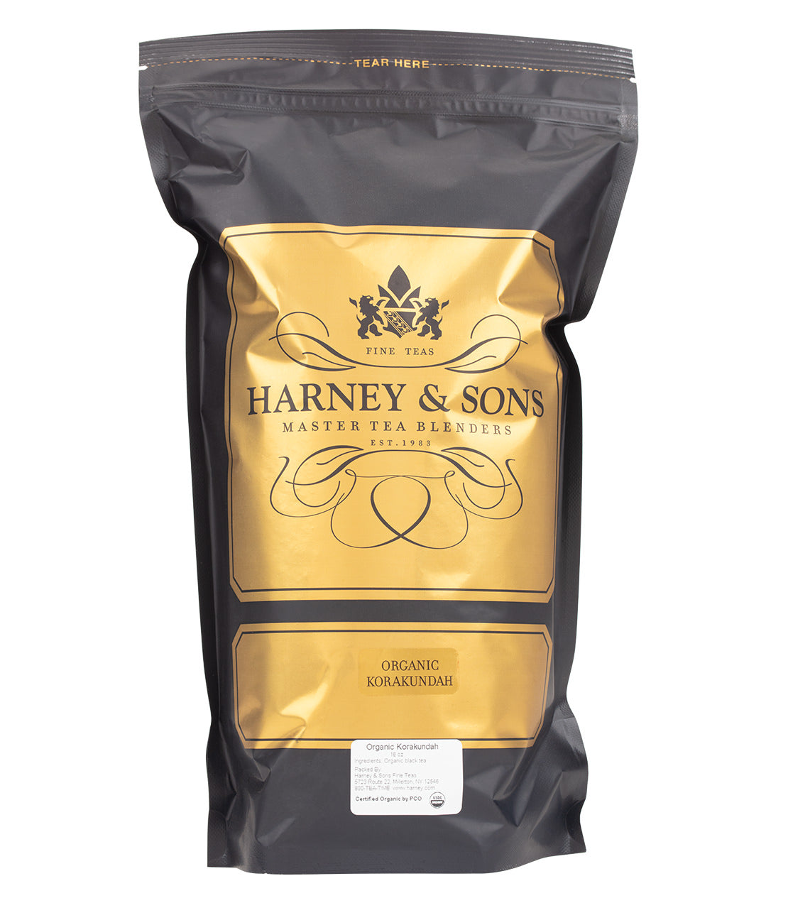 Black packaging of Harney & Sons Organic Korakundah tea, featuring gold accents and brand logo.