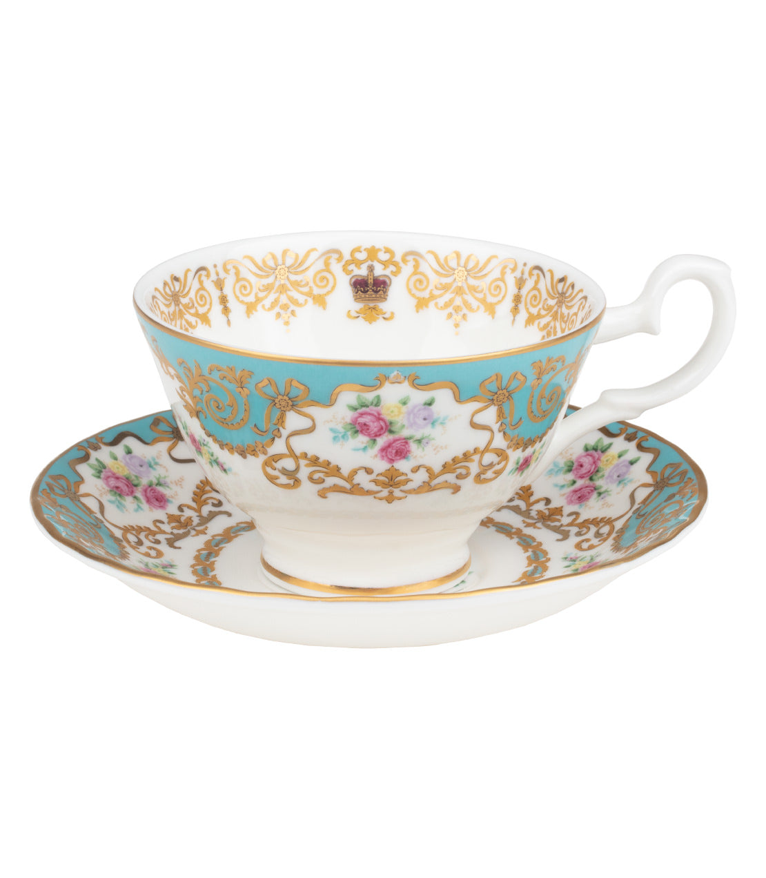 Elegant historic royal palaces teacup and saucer featuring floral designs and gold accents on a turquoise background.