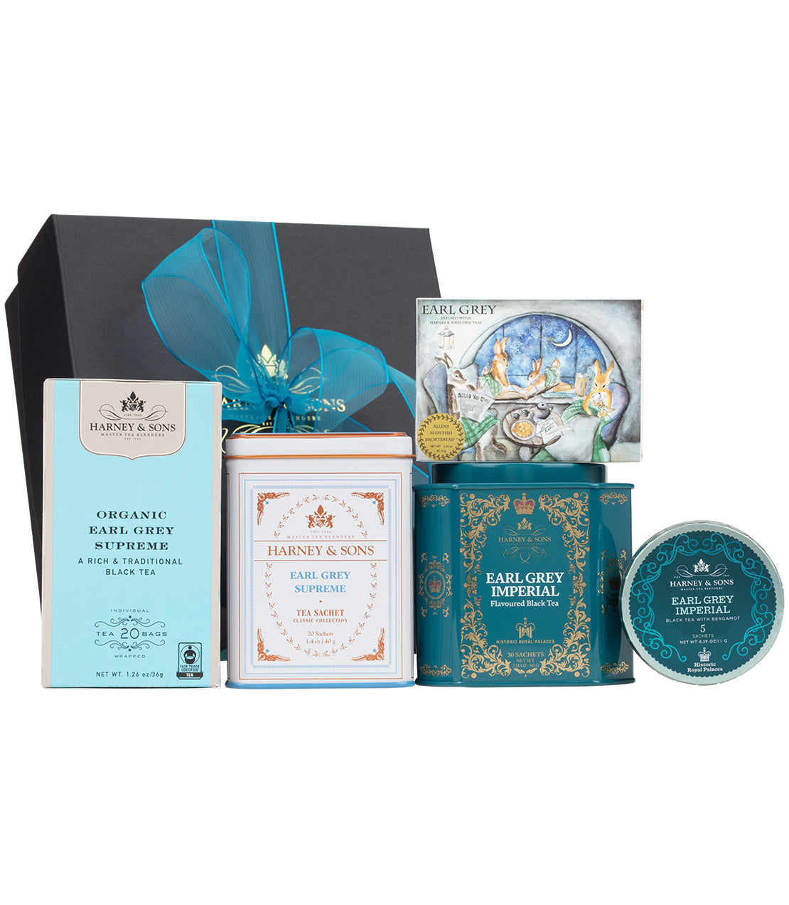 Harney & Sons Fine Teas- Earl Grey gift set featuring tea tins, a tea sampler, and decorative packaging with a blue ribbon.