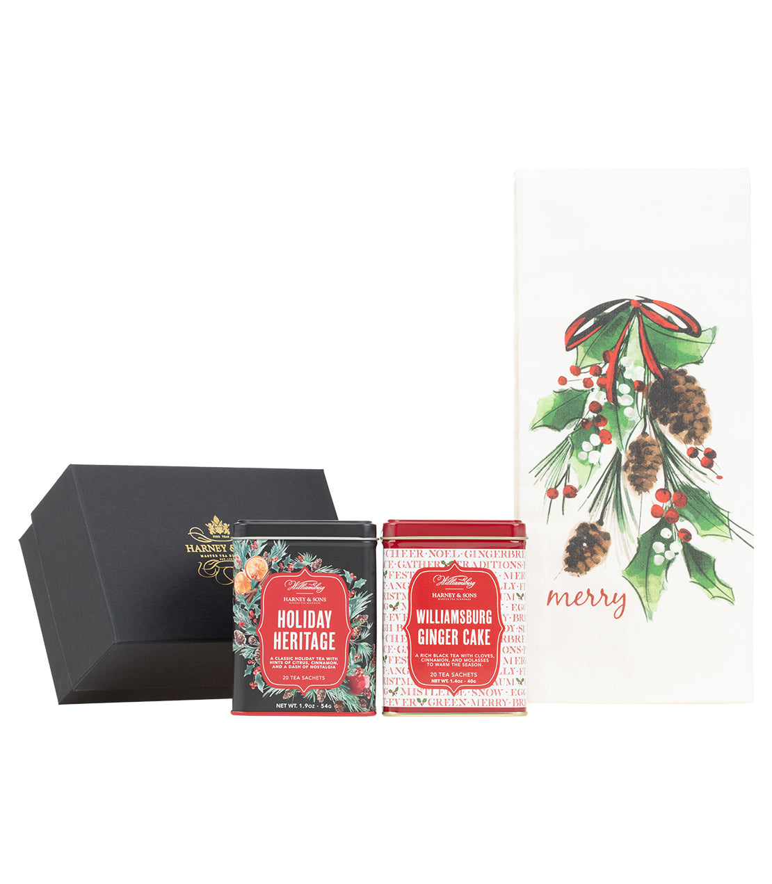 Harney & Sons Fine Teas- Williamsburg Duo Gift- Holiday Heritage and Ginger Cake teas- Tea towel with holly, pinecones, and the word "merry" printed on it 