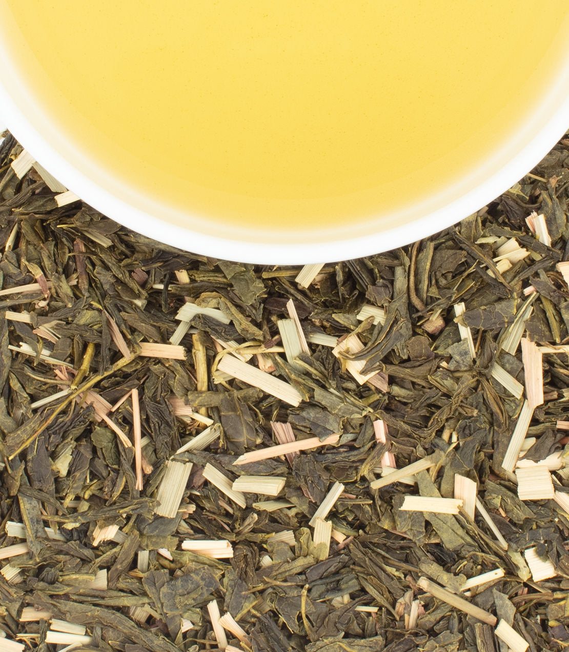 Harney & Sons Fine Teas- Organic Bangkok tea, featuring a blend of green tea and lemongrass, with brewed tea in a cup above.