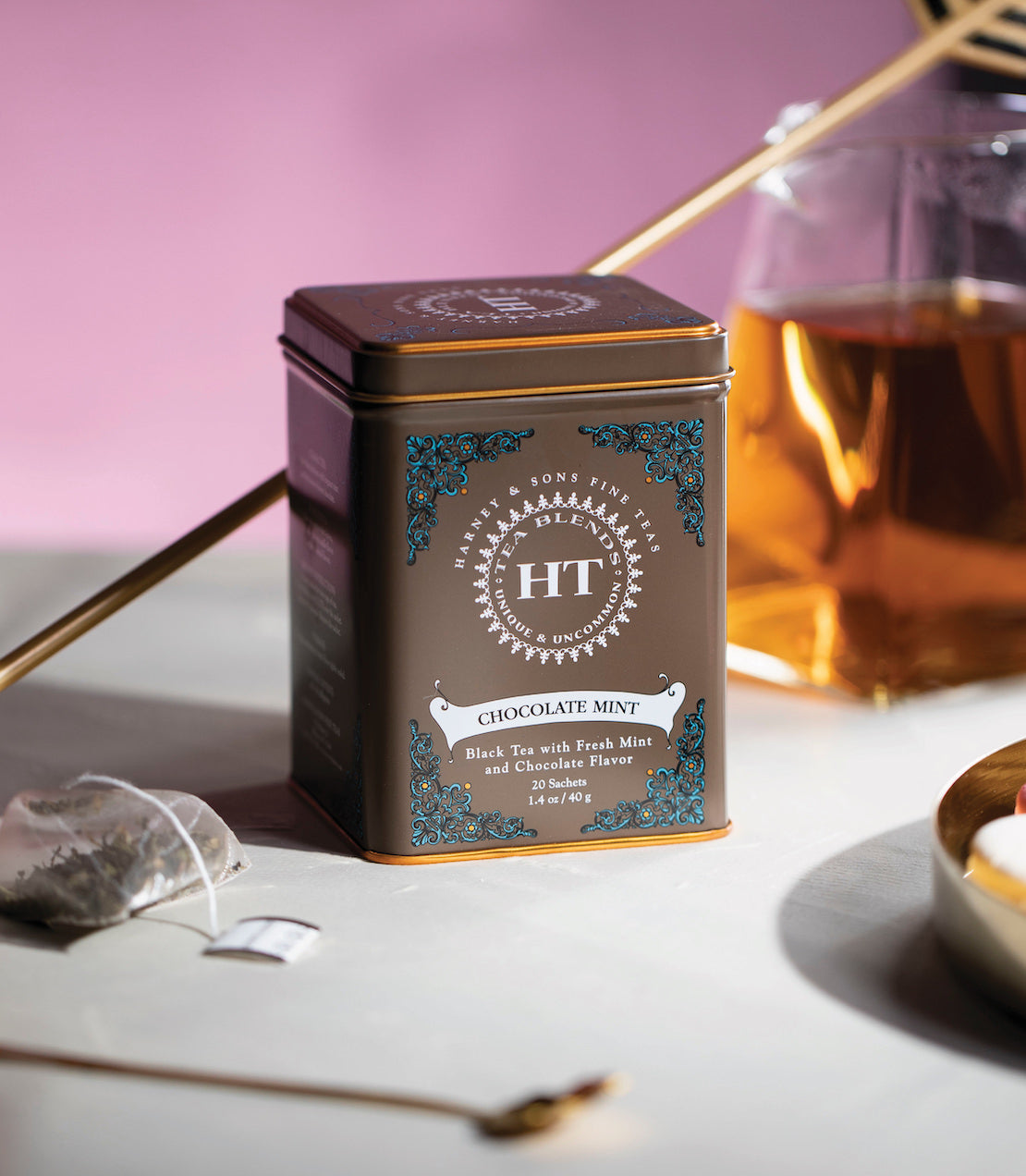 HT Chocolate Mint tin with 20 sachets, featuring black tea with fresh mint and chocolate flavor, on a stylish table.