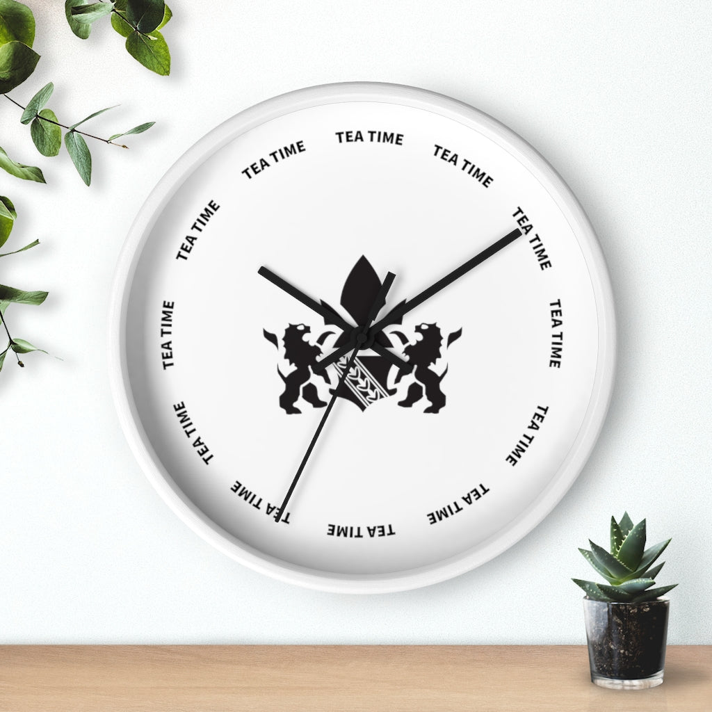 White wall clock featuring a tea time theme, with lion graphics and black hands against a minimalist background.
