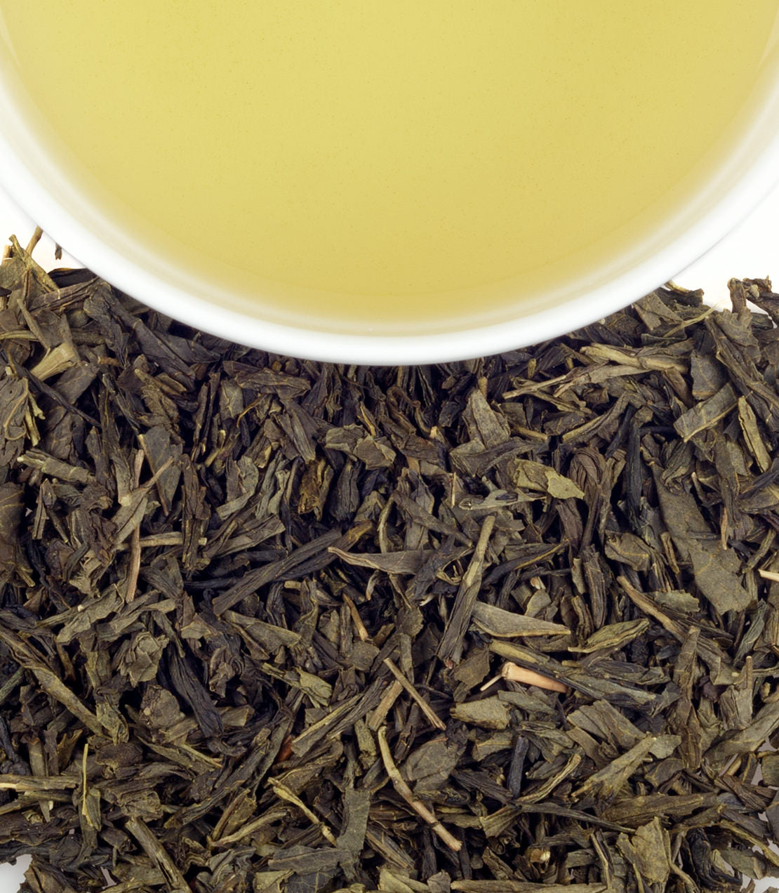 Tropical Green tea sachets, 50-count bag, with brewed tea and loose leaves displayed. Refreshing and aromatic blend.