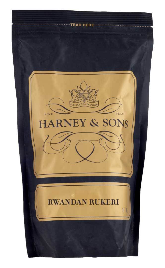 Black tea packaging for Harney & Sons Rwandan Rukeri, featuring a gold and black design with a tear-off top.