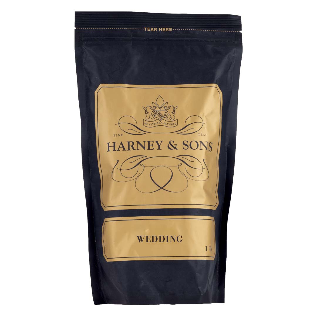 Harney & Sons Wedding Tea packaging, featuring elegant design and gold accents on a black background.