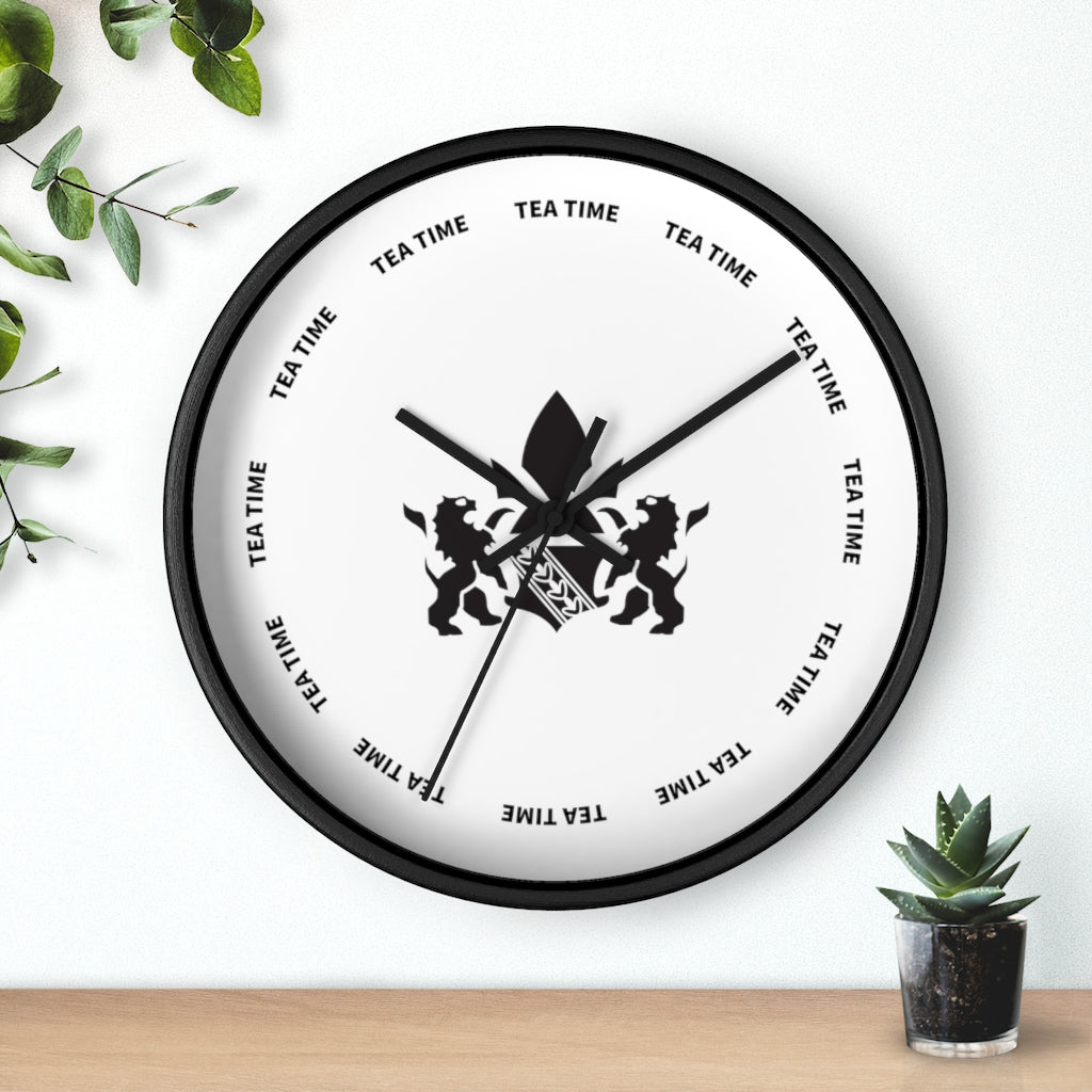Black wall clock featuring a tea time theme with lion graphics and bold text around the face.